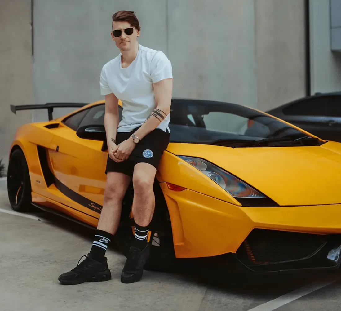 Dyson Buckingham, owner of Prestige Car Imports, with a Lamborghini Gallardo Superleggera
